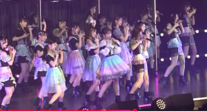 NMB48のコンサートで、カラフルな衣装を身にまといステージでダンスパフォーマンスをするメンバーたち